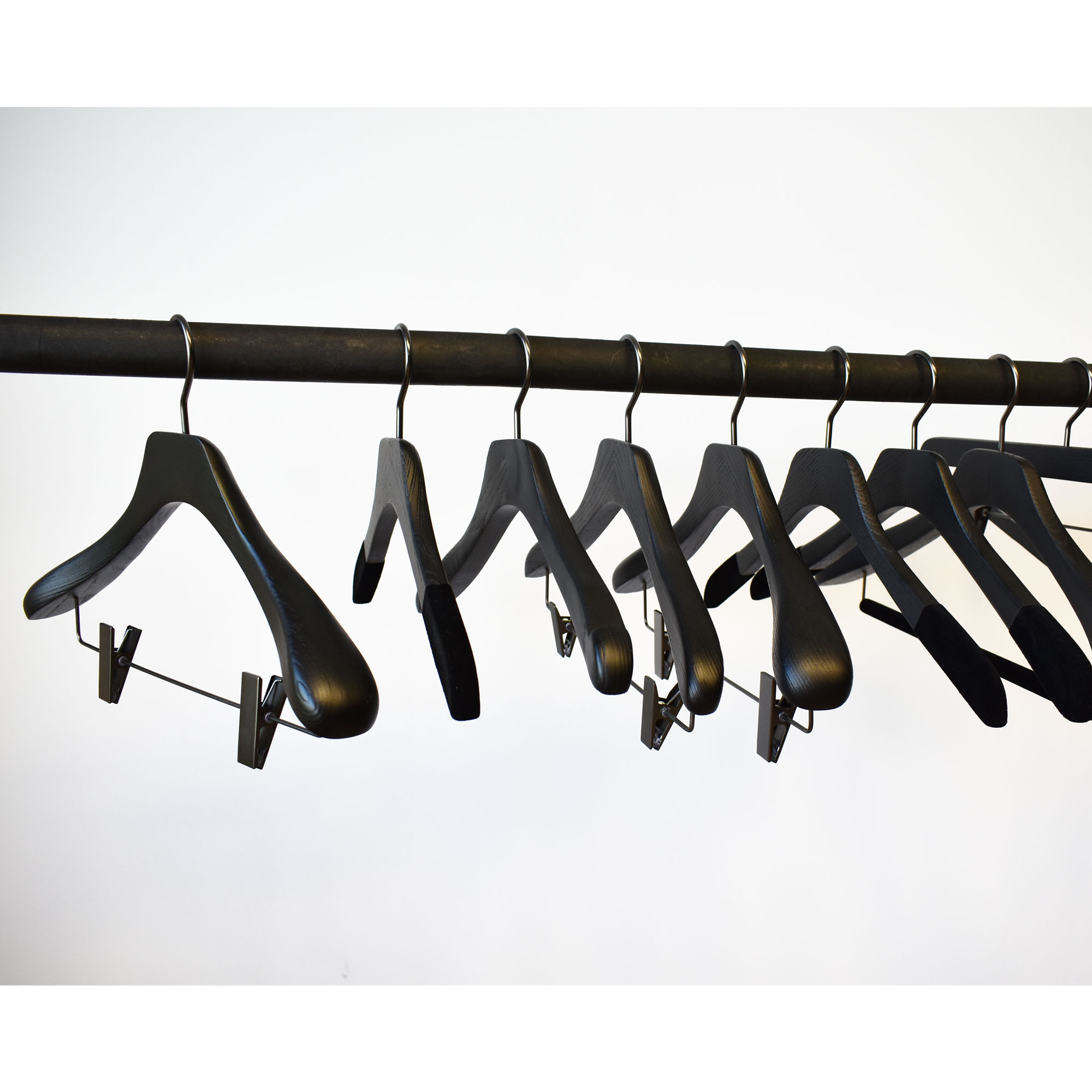 Black wooden hangers with clips for jacket, suit and suit
